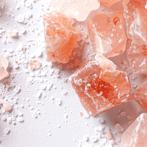 Pink Himalayan salt displayed on a white background providing a clear copy space image for visual impact